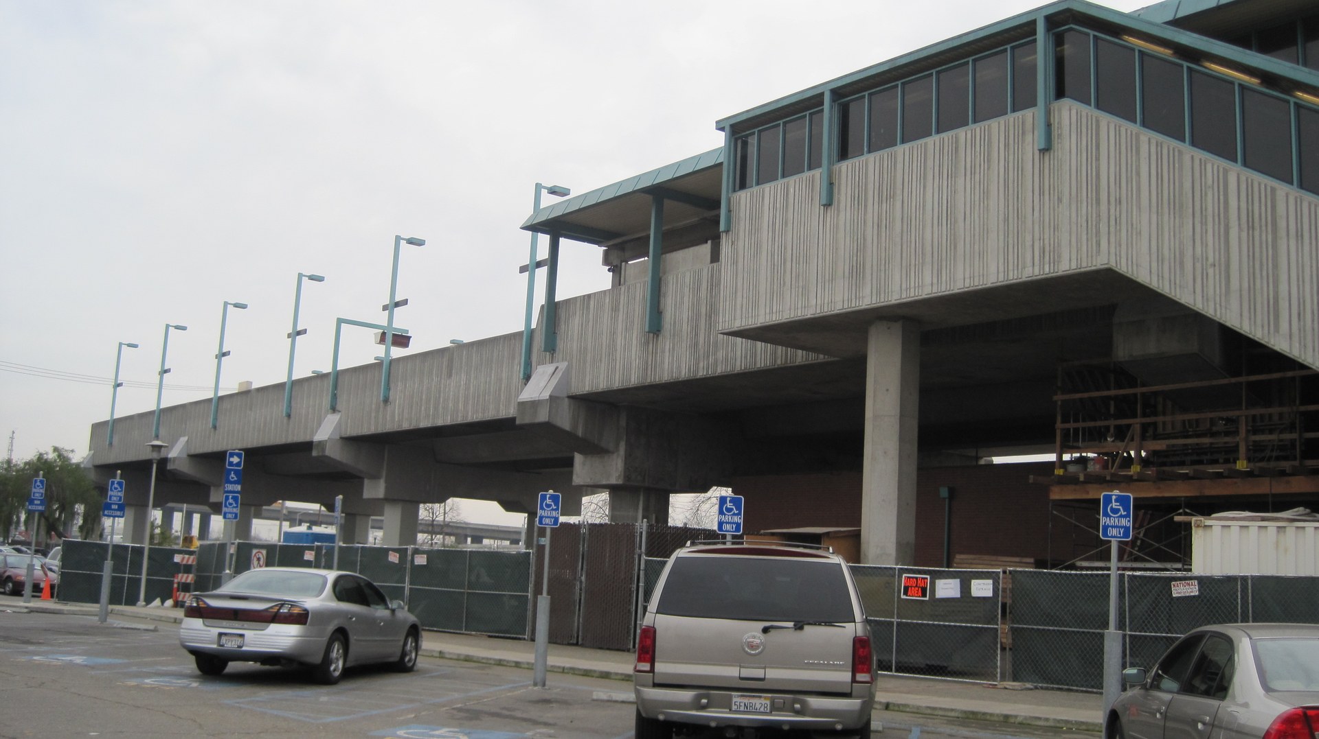 West Oakland BART station exterior on the modern Seventh Street corridor